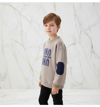Boy wearing sweater - three-quarter angle