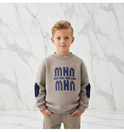 Boy with hands in pockets