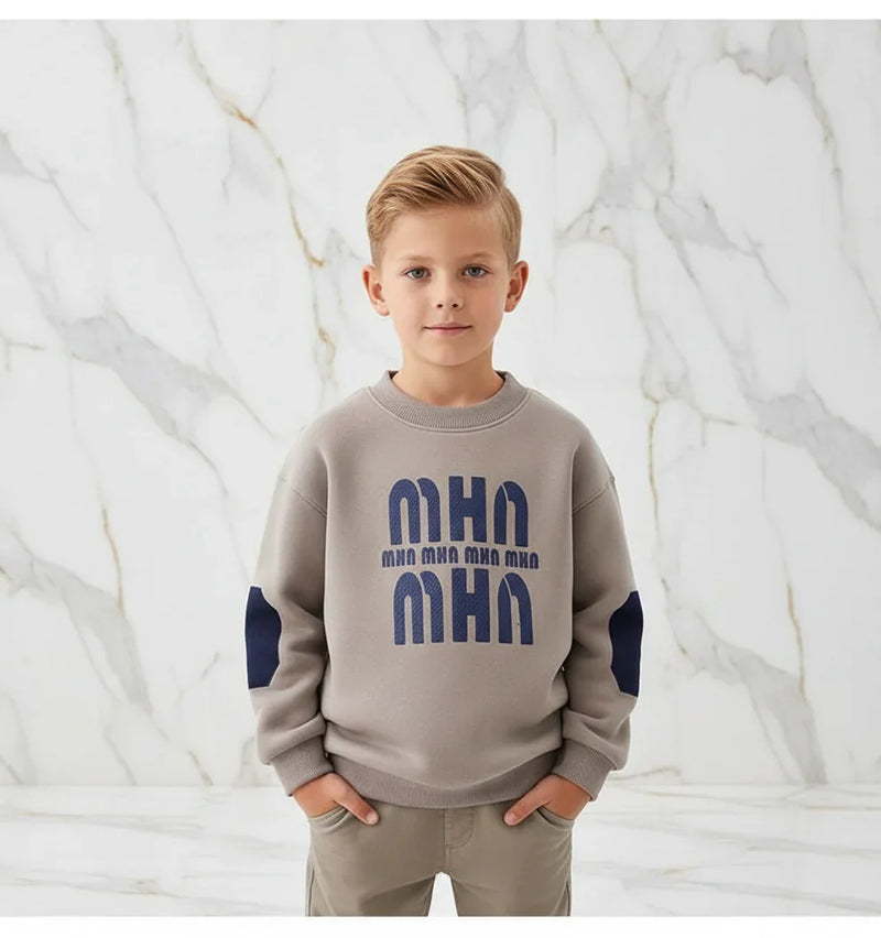 Boy with hands in pockets