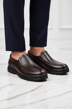 Brown shoe elegant man - close up