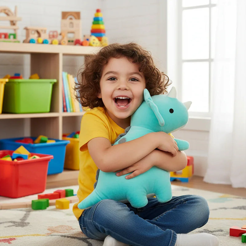 Child with turquoise dinosaur plush