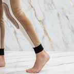 Close-up detail - ankle cuff and lower leg area