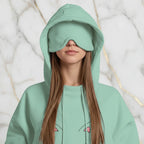 Close-up detail of cat embroidery and eye mask