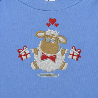 Close-up detail of embroidered sheep design