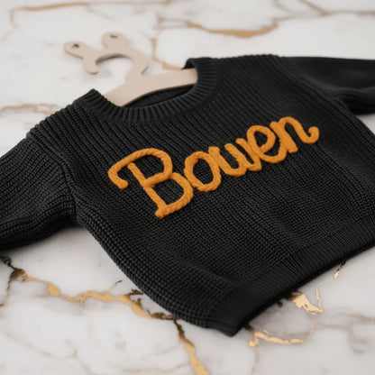 Close-up of "Bowen" embroidered text
