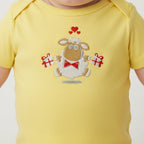 Close-up of embroidered sheep design