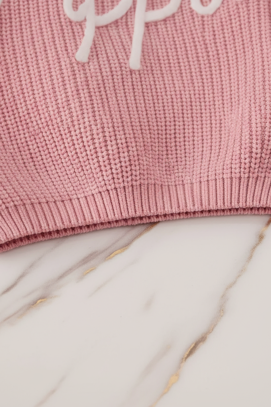 Close-up of hem and ribbing