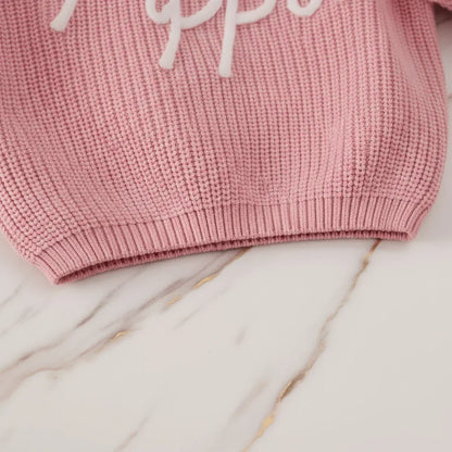 Close-up of hem and ribbing