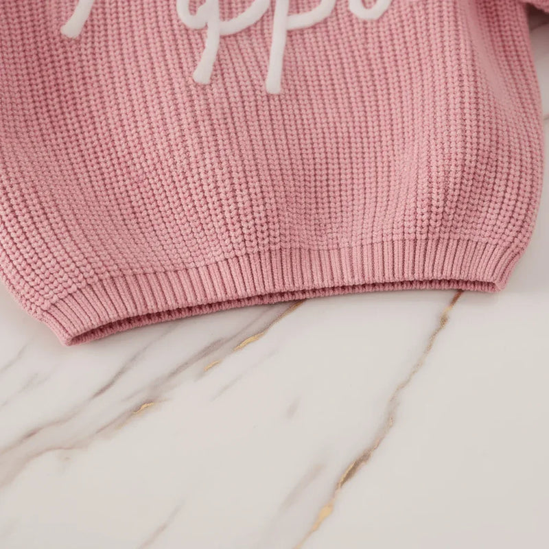 Close-up of hem and ribbing