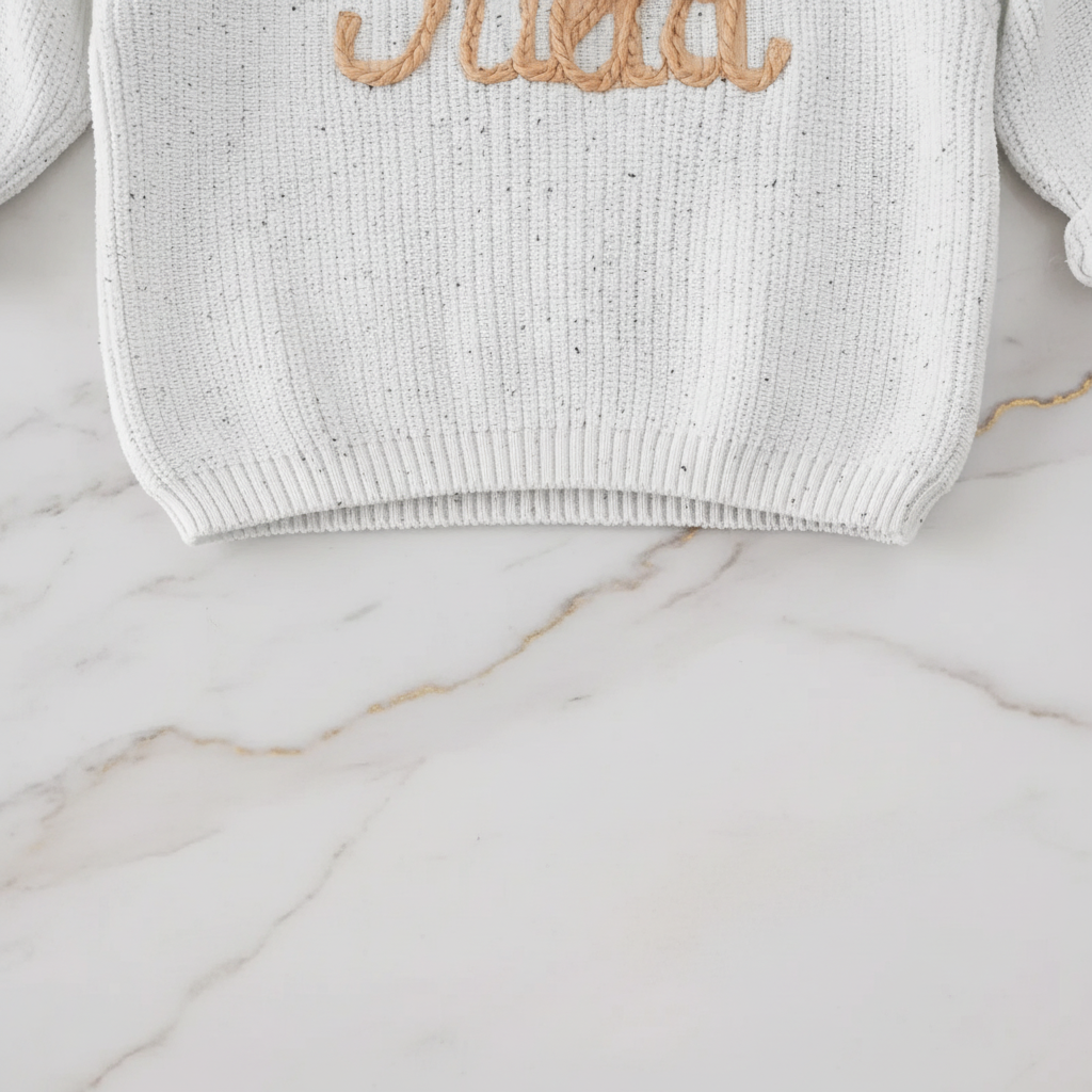 Close-up of hem and ribbing