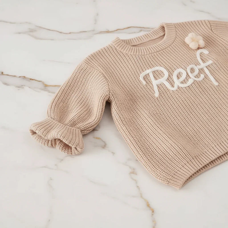 Close-up of knitted texture and sleeves