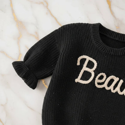 Close-up of knitted texture and sleeves