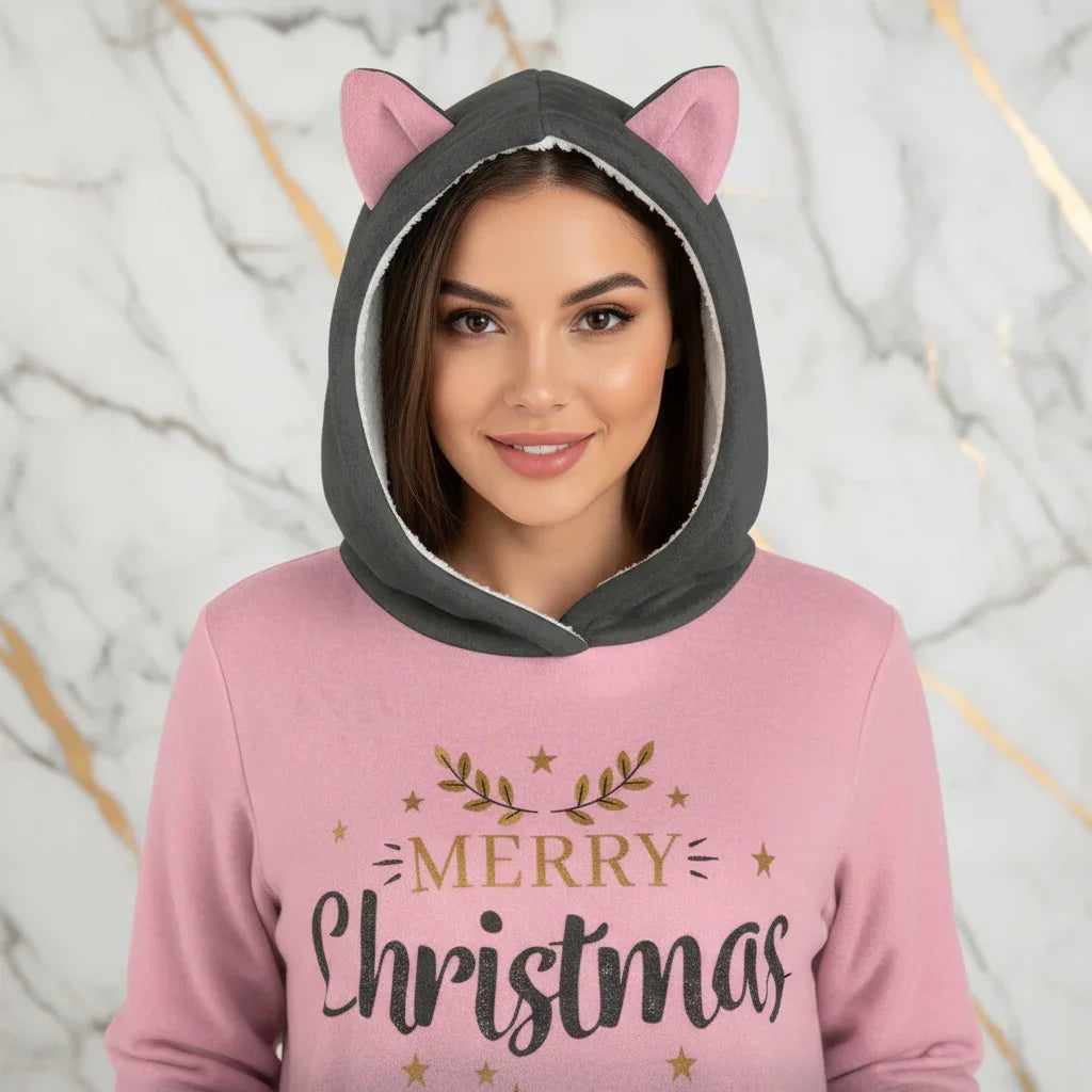 Close-up of Merry Christmas text and cat ears