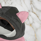 Close-up of pink cat ears on hood