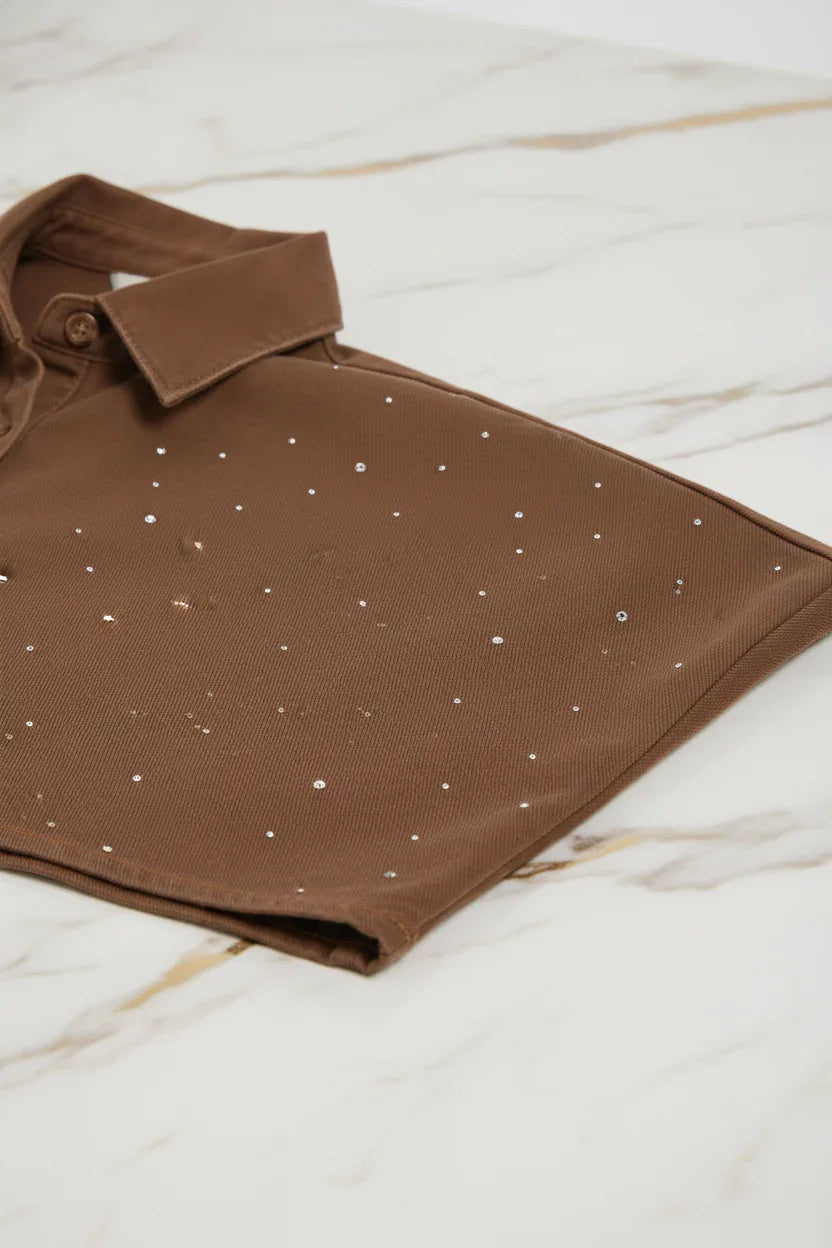 Close-up of rhinestone details on marble background