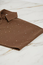 Close-up of rhinestone details on marble background