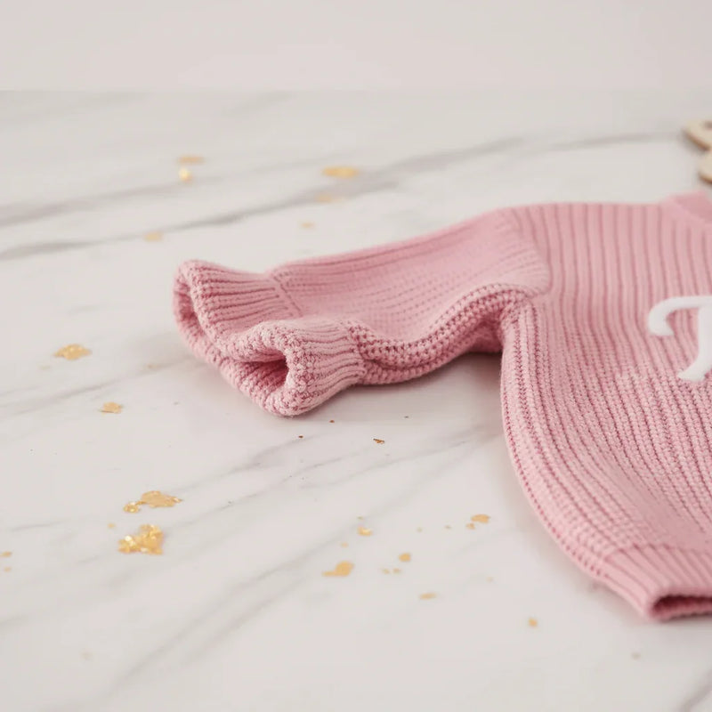 Close-up of ruffled sleeves