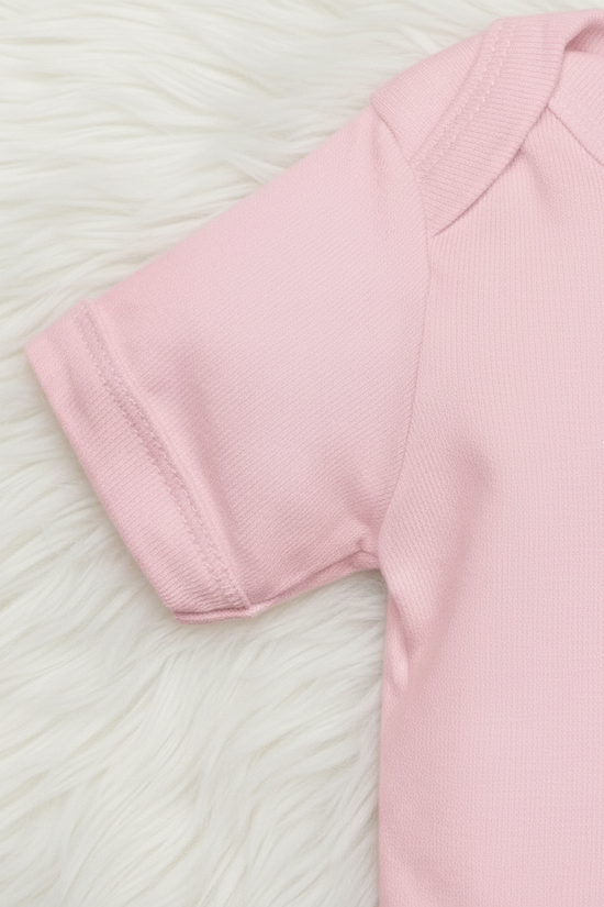 Close-up of sleeve hem and side seam