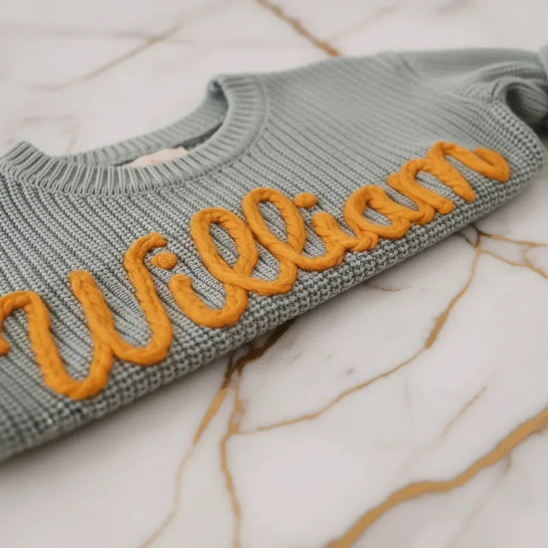 Close-up of "William" embroidered text