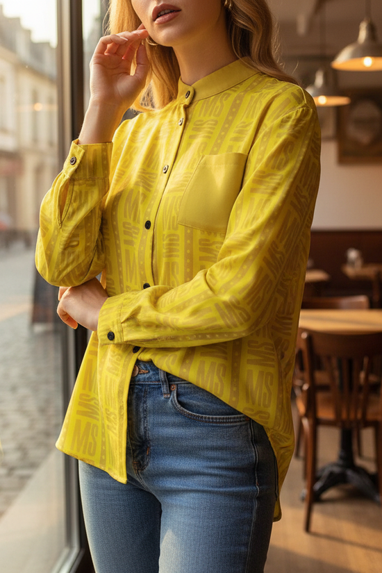 Close-up of yellow shirt details