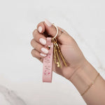 Close-up with manicured hand and luxury jewelry