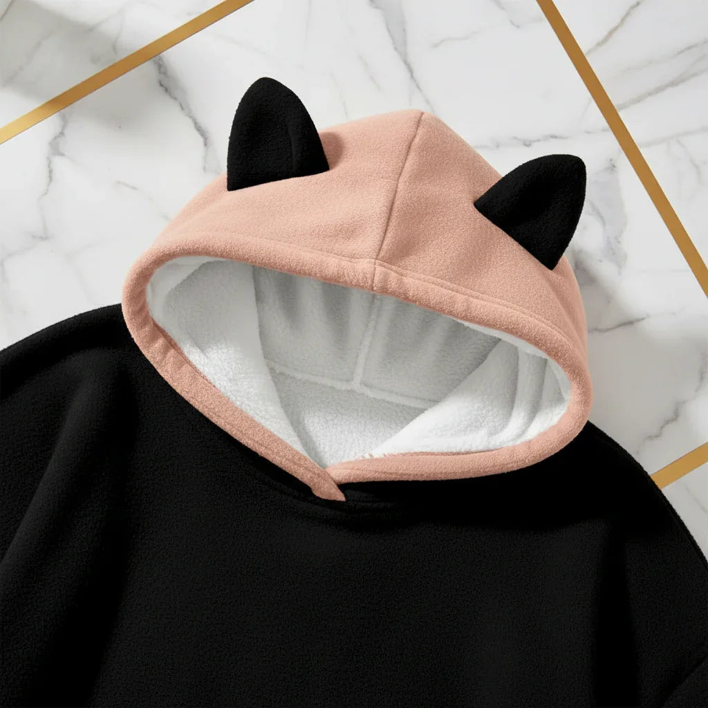 Detail of pink cat ears and white fleece