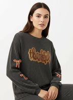 Detail shot of sequins and bows