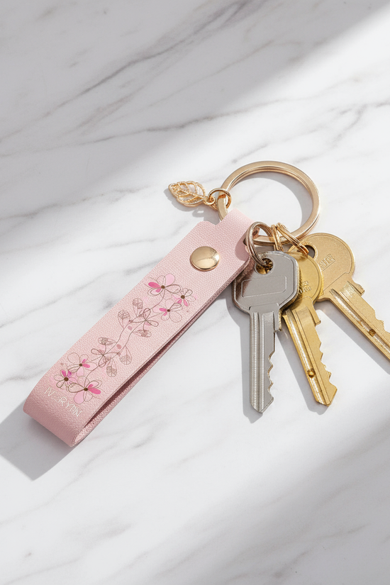 Diagonal composition on marble with keys and charm
