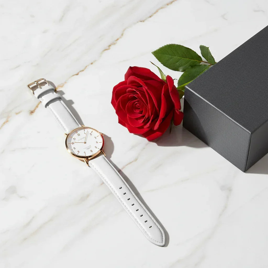 Diagonal composition with watch and rose