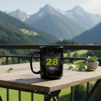 Black dubstep mug on wooden outdoor table with mountain view, modern balcony decor at Ivorynn