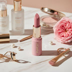 Editorial image with skincare and garden rose