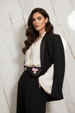 Elegant woman three-quarter pose - Black heart bag