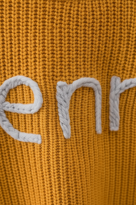 Embroidered name detail