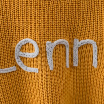 Embroidered name detail