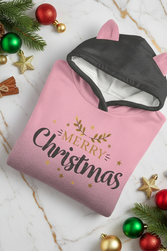 Folded hoodie with pine branches and festive baubles