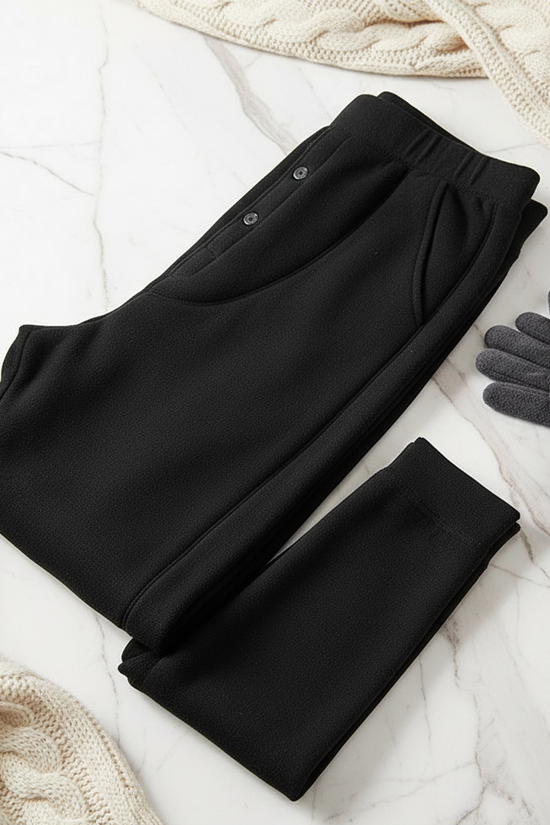 Folded in thirds with cable knit scarf and fleece gloves