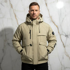 Front view - athletic man in khaki jacket