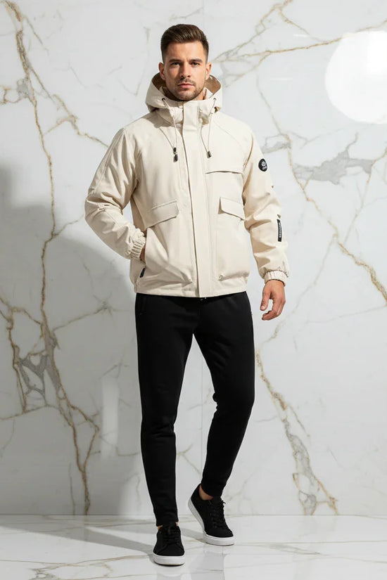 Front view - sporty man in off-white jacket