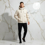 Front view - sporty man in off-white jacket