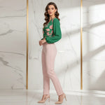 Full-length styled with light pink pants