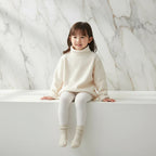 Girl sitting on edge