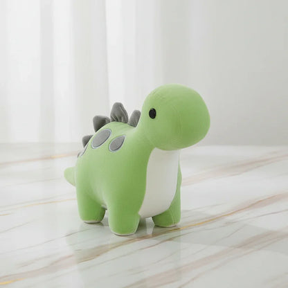 Green dinosaur on marble