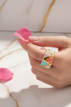 Hand Holding Rose Petal