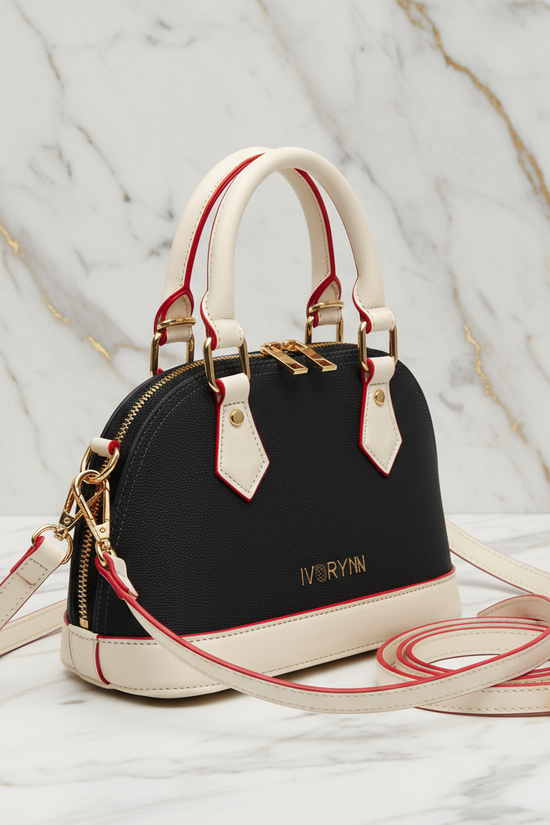 IVORYNN bag - side angle view on gold marble