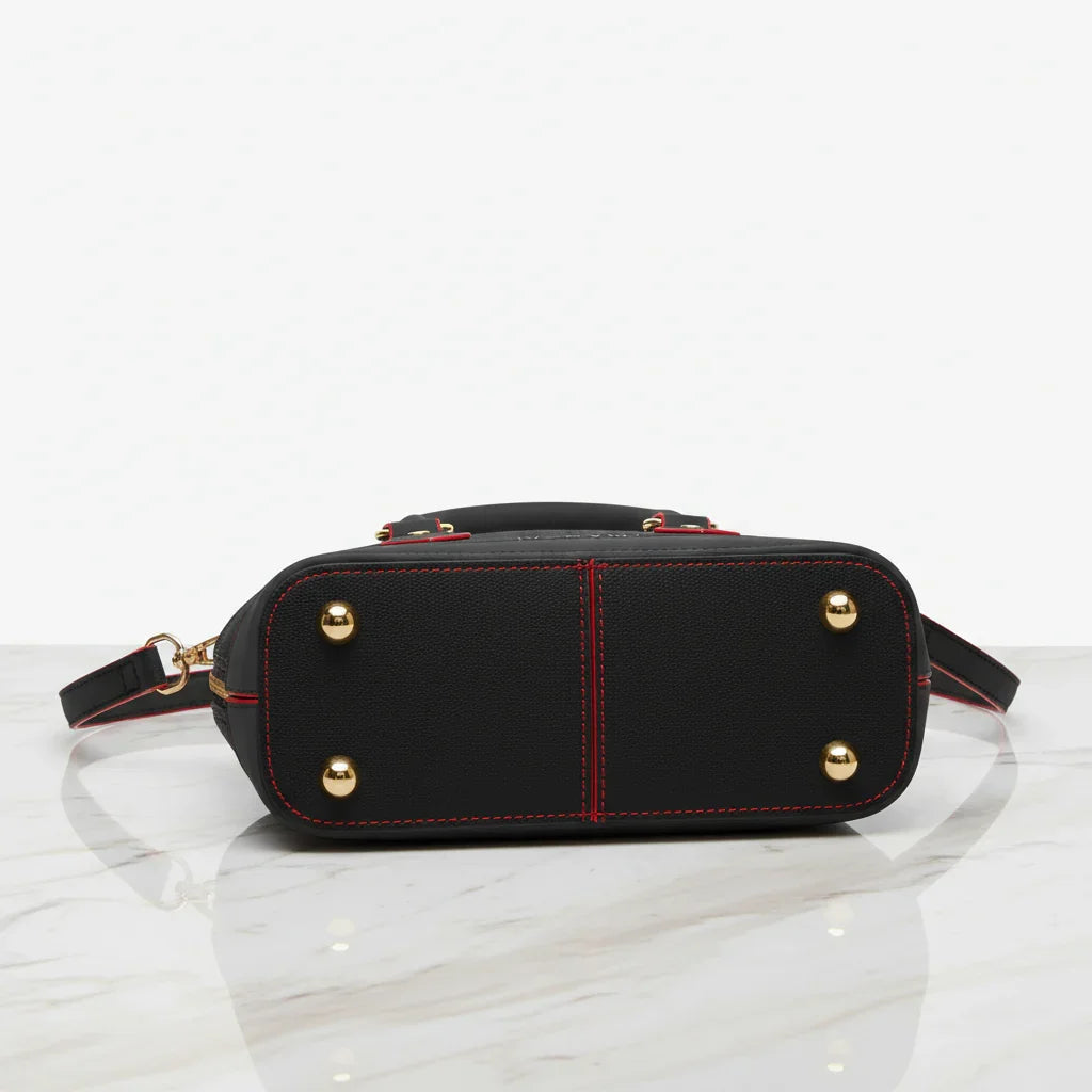 IVORYNN black bag - bottom view on gold marble