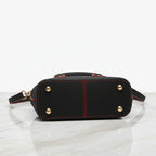 IVORYNN black bag - bottom view on gold marble