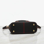 IVORYNN black bag - bottom view on gold marble