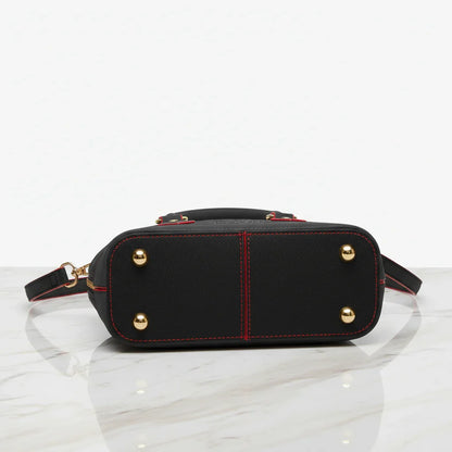 IVORYNN black bag - bottom view on gold marble