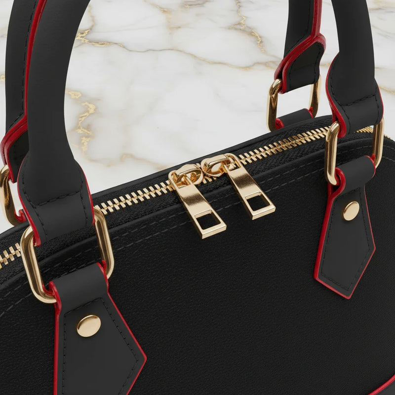 IVORYNN black bag - close-up hardware details on gold marble