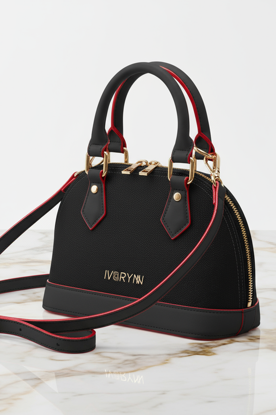 IVORYNN black bag - three-quarter angle on gold marble